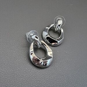 Molten Modernist Doorknocker Earrings | Sculptural Silver Statement